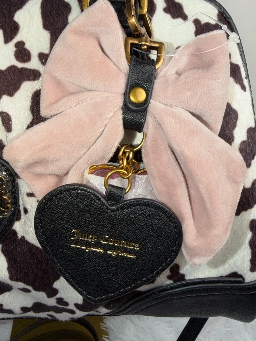 Juicy Couture Black & White Cow Print Satchel with Pink Bow Charm